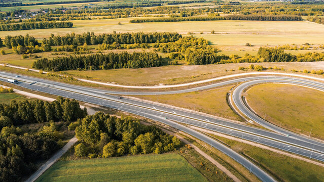 Modern highway intersection in rural landscape