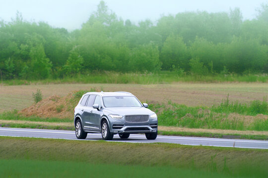 Swedish SUV driving safely on countryside road
