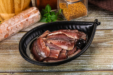 Canned anchovy with oil in the bowl