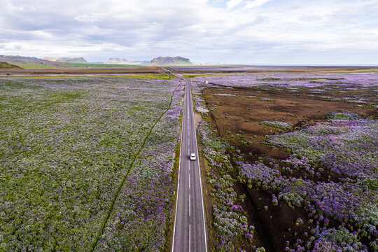 Aerial view of Ring Road through green plains, Iceland