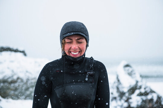 Smiling Woman after a winter surf