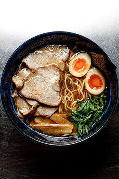 Ramen soup on a plain background isolated in backlight