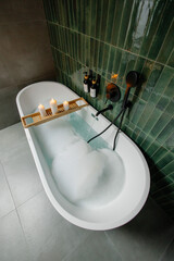 Soothing bubble bath in a modern bathroom
