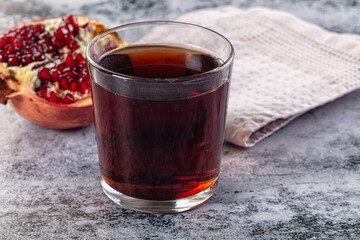Sweet vitamin pomegranate juice glass