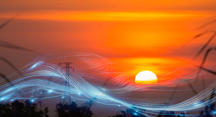 Power transmission line on sunset sky background. Energy and technology concept.