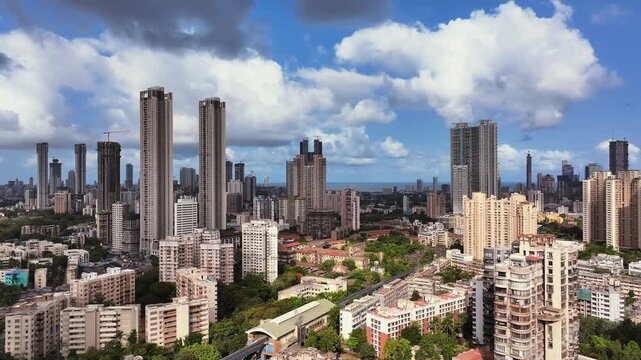 Arial view of Mumbai Skyline, high-rise buildings in Mumbai, Maharashtra India. Cinematic Timelapse shot of Indian cityscape. Most Posh Areas of Worli-Lower Parel in Mumbai.