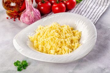 Boiled wheat couscous grain garnish