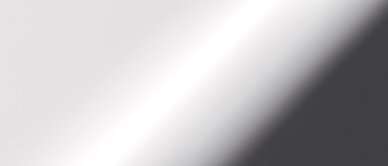 Abstract Gradient An abstract image featuring a dynamic play of light and shadow, creating a subtle gradient across a smooth surface, evoking a sense of depth and modern aesthetics. 