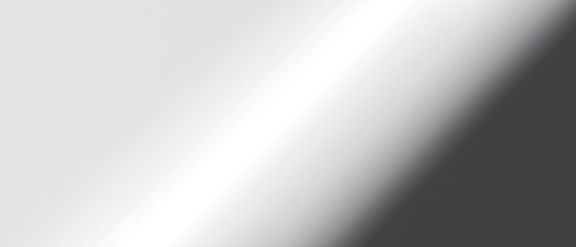 Abstract Gradient An abstract image featuring a dynamic play of light and shadow, creating a subtle gradient across a smooth surface, evoking a sense of depth and modern aesthetics. 