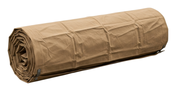 Unrolling brown kraft paper roll for craft projects workspace detail isolated on transparent background