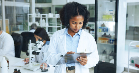 Science, medical research and woman in lab, clipboard and schedule for cancer drug trial. Person,...