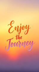 Inspirational quote on a colorful sunset background encouraging viewers to enjoy the journey in life