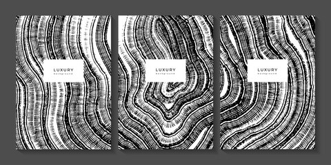 Set of black and white templates with wooden stump texture. Collection of backgrounds with wood imprint. Annual tree rings. Organic eco background. Concentric circles. Templates for business cards