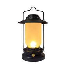 Table lamp shaped like a paraffin lamp turning on the light isolated on white background