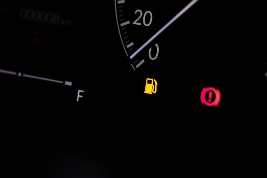 Full Digital Car miles or Speed of meter with Oli Low Fuel Level Warning Light icon symbol on dashboard. transportation concept.