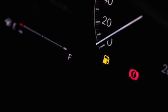 The icon of Oli Low Fuel Level Warning Light icon symbol on dashboard Car miles or Speed of meter with. transportation concept.