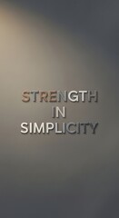 Inspirational quote displayed on a wall emphasizing the value of strength through simplicity in life and work