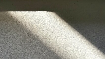 A shadow reflect on the white wall look abstract art , background image.