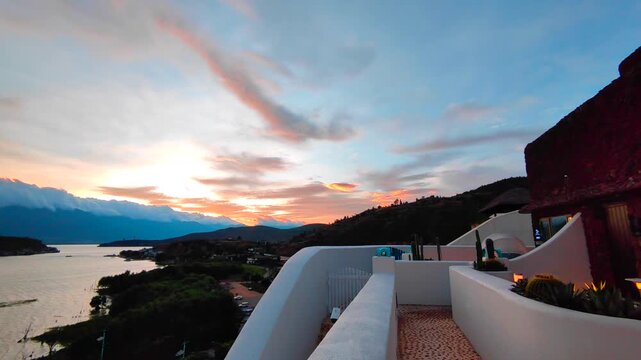 Santorini Dali Sunset Over Mediterranean Coast with Modern White Architecture and Dramatic Sky