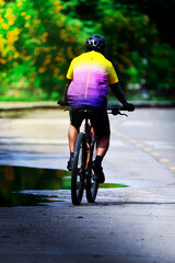 A man rides a mountain bike