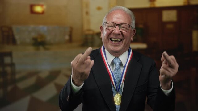 Senior man in suit displaying inappropriate hand gesture in a decorated indoor room while wearing a gold medal and glasses, creating a humorous yet controversial scene