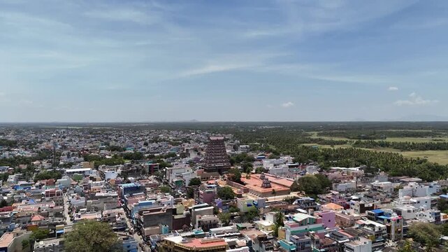 An aerial panoramic view of Tenkasi town in Tamil Nadu, India, featuring the magnificent Kasi Viswanathar Temple (Tenkasi Temple) at the center. The ancient Dravidian-style temple tower gopuram