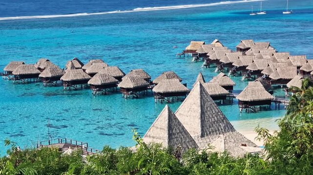 Island on French Polynesia, Traditional Overwater Bungalows, Part of Luxury Tropical Resort on Turquoise Lagoon Water