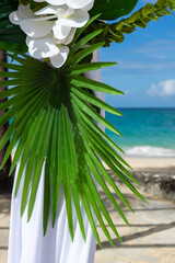 A destination wedding framed by sea, sky and flowers. Where paradise meets eternal love