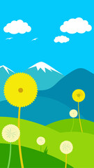 Fototapeta premium Dandelions in a field with mountains and blue sky