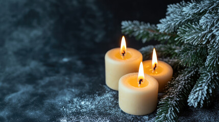 Fir branches with three burning candles against dark grey background, candles, snowy, winter