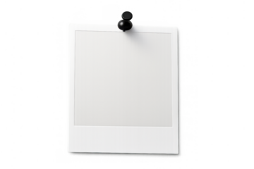 Blank instant print film frame pinned to a surface, creating space for custom memories and retro design content