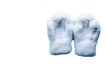 Cute furry mittens with a soft white texture, perfect for keeping hands warm during chilly winter days or festive occasions.