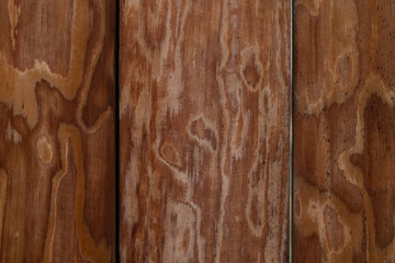 Wooden plank wall with natural wood grain texture