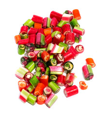 Sweet multi-colored candies on a white background
