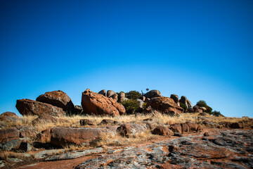 Australia, Tcharkuldu Rock is very photogenic granite rock formation in South Australia. This place is perfect for hiking, taking photography, and connecting with nature's beauty.