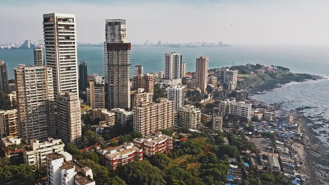 Aerial view of the Mumbai skyline featuring high-rise buildings in South Mumbai, Maharashtra, India. A cinematic shot capturing the stunning cityscape of Mumbai&rsquo;s iconic financial district.