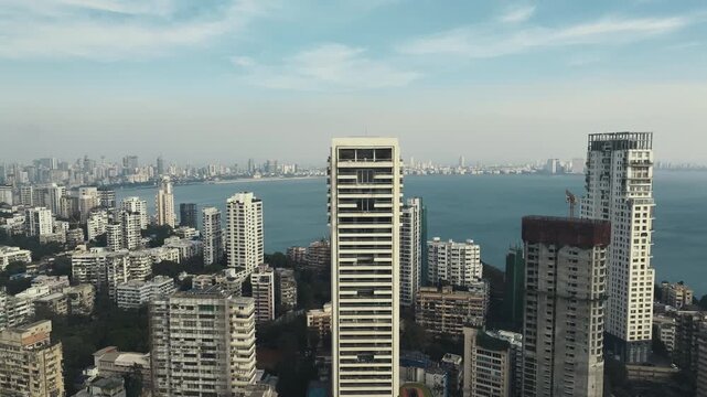 Aerial view of the Mumbai skyline featuring high-rise buildings in South Mumbai, Maharashtra, India. A cinematic shot capturing the stunning cityscape of Mumbai&rsquo;s iconic financial district.