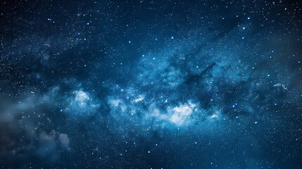 Obraz premium A celestial panorama with glowing nebula and countless twinkling stars afar view