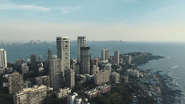 Aerial view of the Mumbai skyline featuring high-rise buildings in South Mumbai, Maharashtra, India. A cinematic shot capturing the stunning cityscape of Mumbai&rsquo;s iconic financial district.