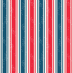 Striped pattern with dotted sprinkles, winter holiday seamless background