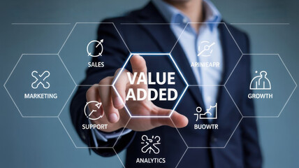Businessman touching a screen with icons representing value added services like sales, marketing, support, analytics, and growth