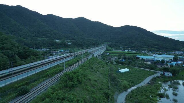 Korean scenery and fast trains move. The train is KTX & SRT