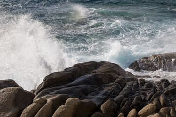 sea wave crashing the rocky coast. nature power concept. aesthetic abstract nature background. stormy sea background. nature art. weather and