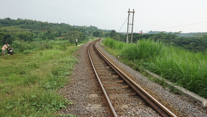 Obraz premium Railway Track Perspective View at sunset