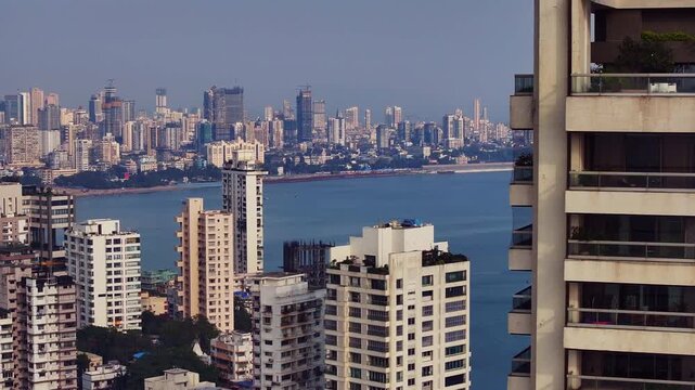 Aerial view of the Mumbai skyline featuring high-rise buildings in South Mumbai, Maharashtra, India. A cinematic shot capturing the stunning cityscape of Mumbai&rsquo;s iconic financial district.