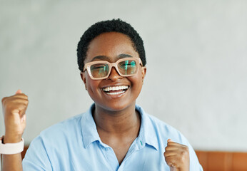 Portrait of a smart young happy afican american businesswoman or student or young woman girl in the office or a classroom. Startup and succesful business concept