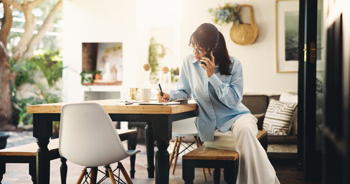 Woman, phone call and writing in notebook in home for venue booking, date schedule and remote work. Freelancer, event planner and contact client on patio for vendor negotiation and planning process