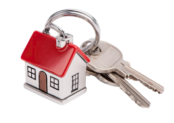 Silver key and house shaped keychain displayed on transparent background
