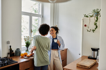Happy couple enjoying quality time in a stylish home kitchen