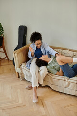 Happy couple enjoys a cozy afternoon together in their modern apartment